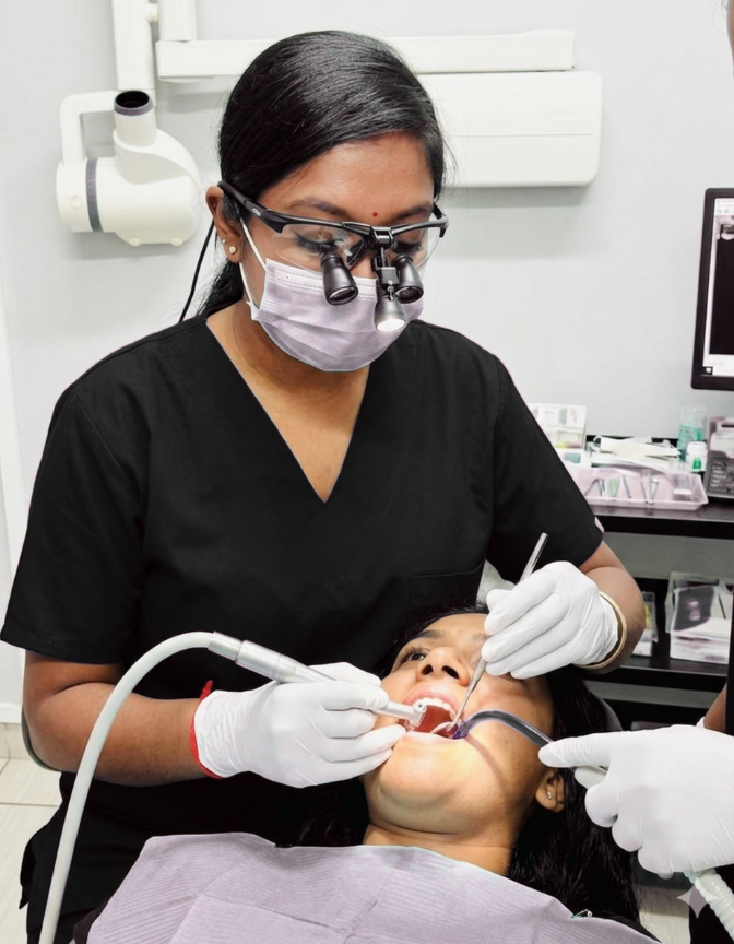 Dr Yavini Naidoo treating a patient